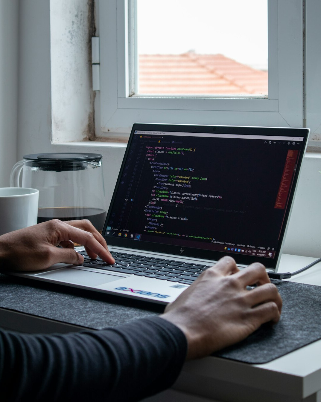 person coding at home