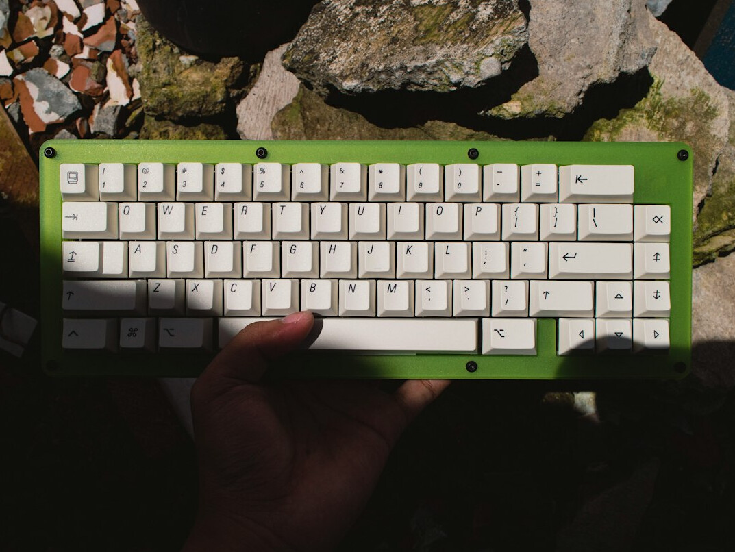 Person typing on a mechanical keyboard